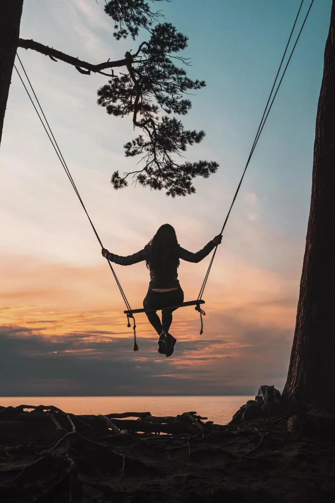 a woman on a swing